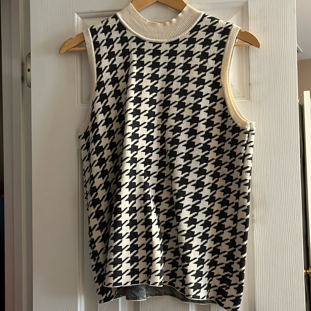 Ann Taylor Loft black checkered sweater vest, size medium.